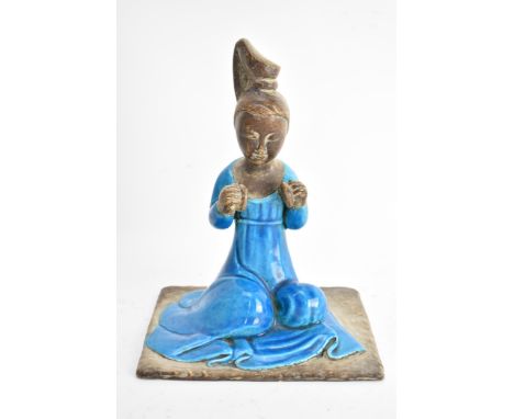 Ugo Urbano Zaccagnini, Florence Italy, a turquoise glazed ceramic model of a seated Geisha girl, circa 1950's, signed to base