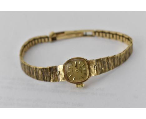 A Rotary 9ct gold ladies wristwatch with a square, batten dial, on a textured, flexible strap, 15.3g total 