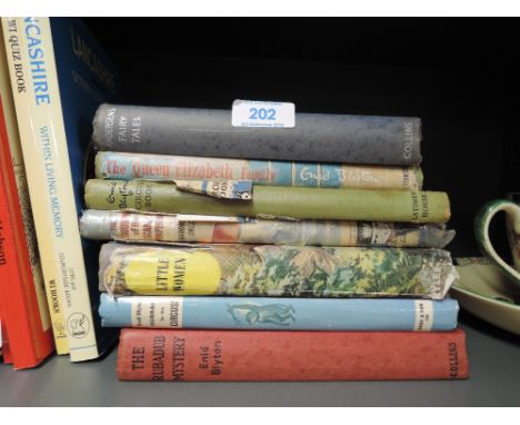 A selection of vintage childrens story books including Enid Blyton