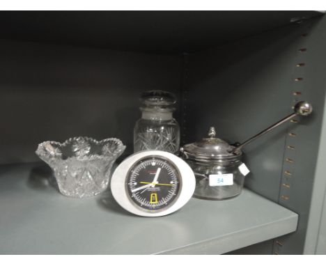 A selection of glass ware also an alarm clock etc