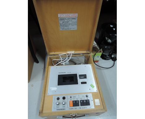 A vintage Tandbergh TCR 5500 student panel cassette system