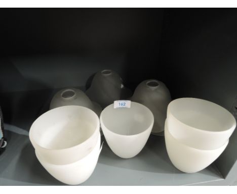 A selection of various glass light shades