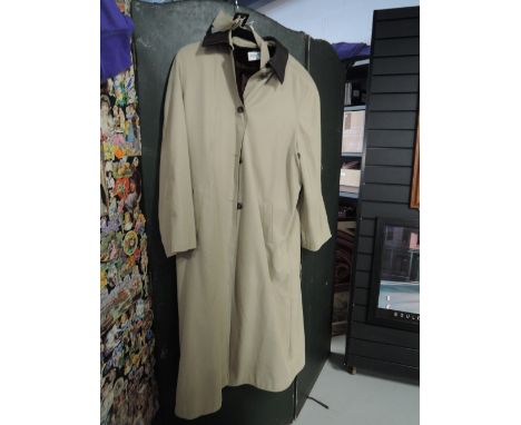 A ladies belted coat by Henry White, size 20.
