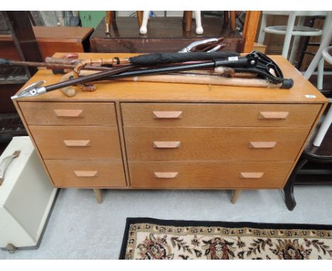 A vintage golden oak low bedroom chest