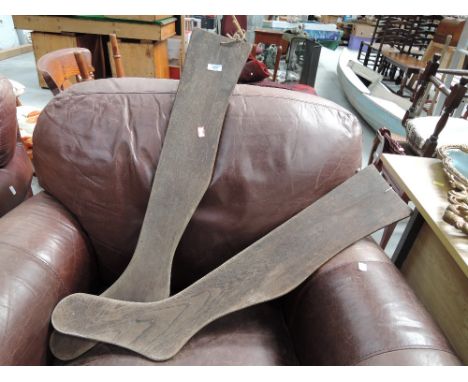 A pair of vintage oak stocking display legs