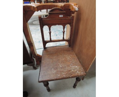 A vintage vestibule chair oak with turned details