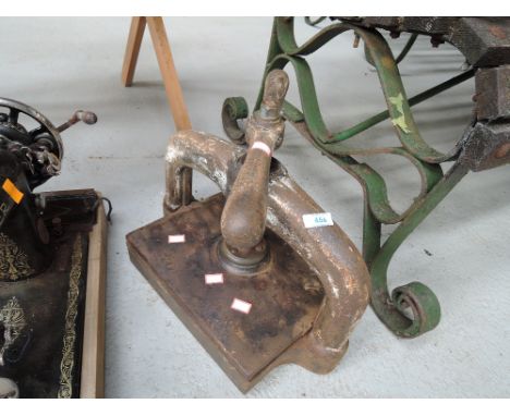 A vintage cast book press