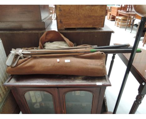 A selection of vintage golf and cricket items
