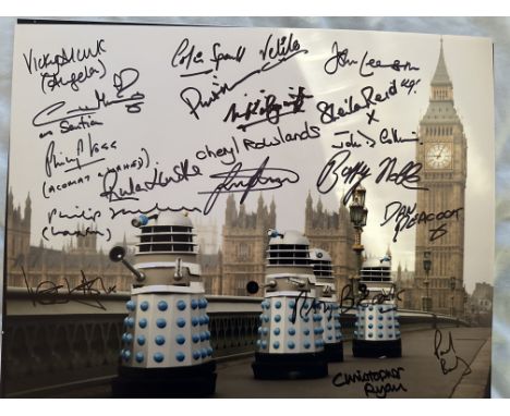 Doctor Who Daleks scene 14x11 inch colour photo signed by TWENTY actors who have appeared in the series, including Caroline M