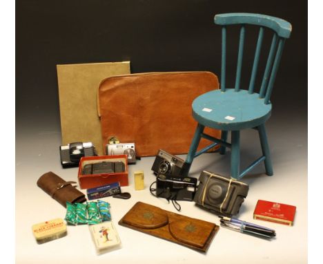 A doll's chair; a sliding book shelf; cameras, including Olympus AF-10, Kodak Coloursnap, etc, 35mm; 35mm film packs; booklet