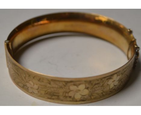 A 9ct gold bangle, 21.5g