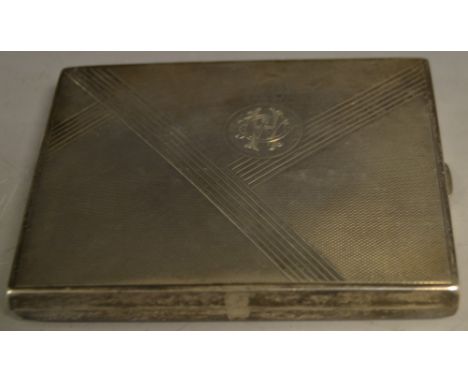 A silver cigarette case, engine turned, gilt interior, Birmingham 1946, approx 5.3oz