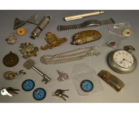 Boxes and Objects - a novelty recumbent pig vesta case; Military cap badges, an Elgin open face pocket watch, a Metropolitan 