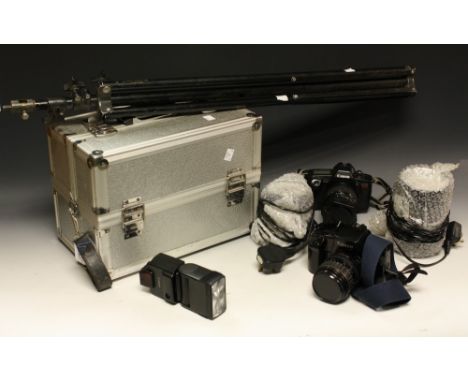Photographic Equipment - a Canon EOS620 camera; another, Canon EOS100 SLR camera, in aluminium travel case; lenses and leads;
