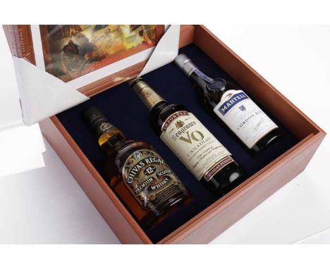 SEAGRAM'S STAFF GIFT BOX 1924 - 2001 
To Include: CHIVAS REGAL 12 YEAR OLD Blended Scotch Whisky. 75cl, 40% volume. SEAGRAM'S
