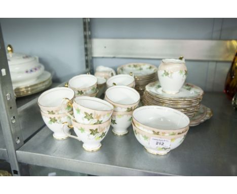 A ROSLYN FINE BONE CHINA 'EL-DORADO' PATTERN TEA SERVICE FOR 12 PERSONS, 40 PIECES, WITH PRINTED VINE PATTERN BORDER (ONE TEA