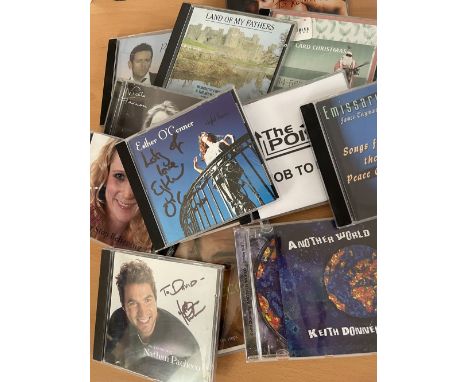 Music collection of signed CD sleeves complete with discs, 12 in total. Titles Include Kayla; Never Stop Believing, Esther O 