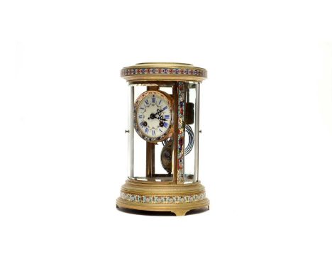  S Marti et Cie, Paris: a French champleve enamelled and gilt circular four glass mantel clock, circa 1900, the eight-day gon