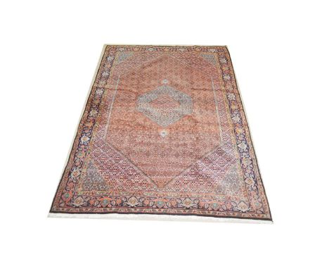 A Bidjar carpet, the lozenge shaped fields with flowerhead design, 341 x 234cms.