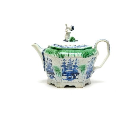 An unusual late 18th-century pearlware teapot, probably Liverpool, of lozenge form, with mermaid finial, painted in underglaz