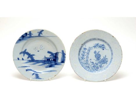 A mid 18th century English Delftware plate, probably Bristol, decorated in blue in the Chinese manner with growing bamboo and