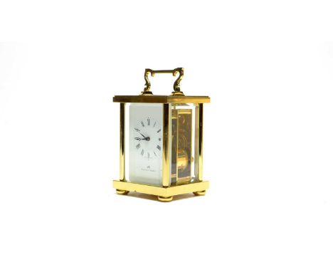A Matthew Norman carriage clock, the white roman dial with blued hands, manual wind movement, striking the hours and half hou