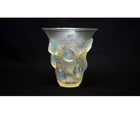A Lalique 'Saint Francois' opalescent glass vase, model 1055 circa 1930, moulded with birds and leafy branches, etched mark '