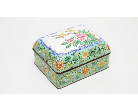 A Chinese enamel lidded box, decorated with peony and prunus, on a turquoise foliate scroll ground,12cms.