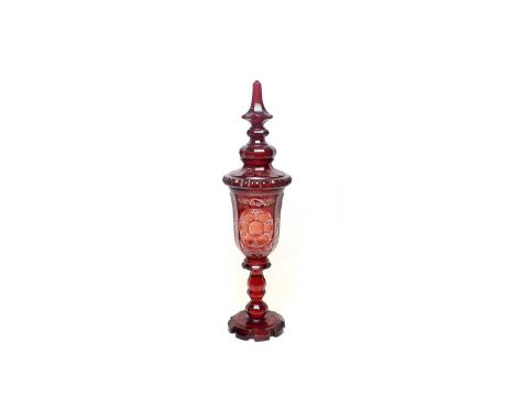A large mid 19th century Bohemian ruby flash glass gobet and cover, well engraved with a panel of stags and hinds in a landsc
