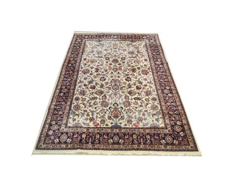 A Sarough carpet, with floral scrolls on ivory coloured ground, 366 x 246cms.