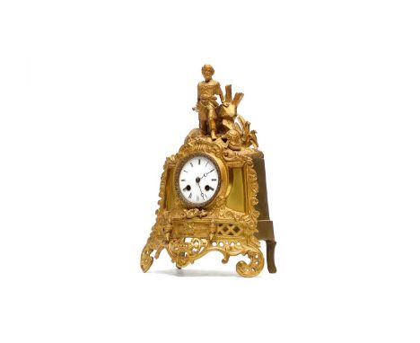 A late 19th Century French gilt metal mantel clock, with enamelled roman dial and 8-day movement striking on a bell, the case