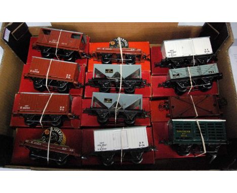 Twelve post-war Hornby wagons all BR:- goods brake, 2 x goods vans, 2 x flat with cable drums, 2 x hopper, 2 x insul meat, on