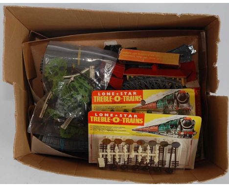 One box containing a quantity of Lone Star Treble-O-Trains, mixed examples to include carded boxed and loose accessories and 