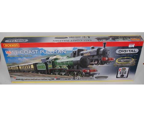 A Hornby digital R1097 East Coast Pullman trainset containing LNER green class B12 engine and tender, LNER black class J52 ta