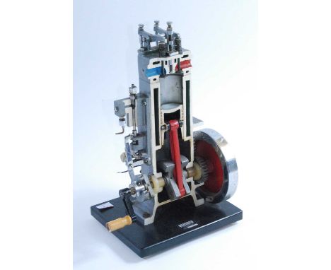 An Irwin &amp; Partners Ltd of Croydon cast alloy cut-away demonstration model of a diesel internal combustion engine, h.16",