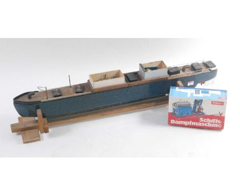A home-made scratch built wooden model of a sailing barge, mainly constructed from wooden components with carved hull, fitted