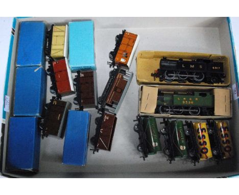 Selection of post-war Hornby Dublo items, black sans-serif LMS tank engine (G) LNER green tank engine (G), 11 D1 wagons inclu