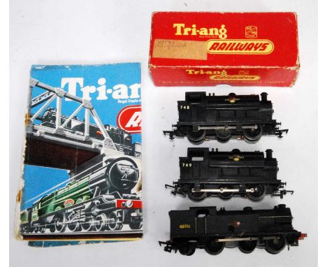 An early Triang clockwork 0-6-2 tank engine repainted dark green (FR) 2x R153 saddle tank engines, one in box (G-BG) and No. 