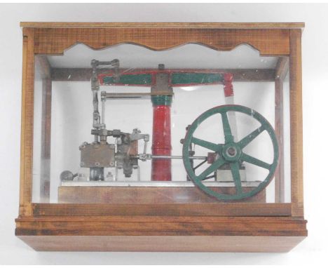 A scratch built home constructed model of a stationary beam engine, of usual construction, with single cylinder, Watts parall