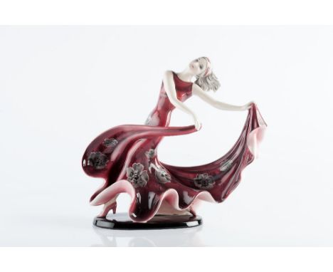 Stefan Dakon (1904-1992) for Goldscheider Figure of a lady dancing in red dress impressed factory mark, facsimile signature a