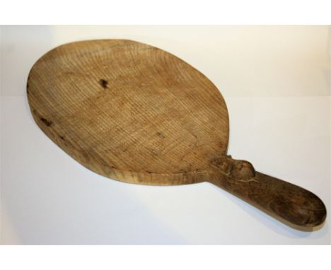 Robert Thompson of Kilburn (1876-1955) Mouseman bread board oak carved mouse  38cm long.