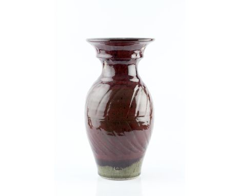 Trevor Corser (1938-2015) at Leach Pottery Vase red glaze, with cut sides impressed potter's seal covered with glaze 35.5cm h