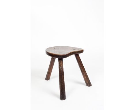 Robert Thompson of Kilburn (1876-1955) Mouseman stool, 1920s/1930s oak on three octagonal legs carved mouse 43.5cm high, 38.5