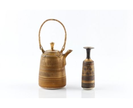 Mary Rich (b.1940) Miniature teapot and vase highlighted in gold each impressed potter's seal 16cm high and 9.8cm high (2).