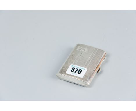 A lady's engine turned silver cigarette case, 2.2 ozs, Birmingham 1930