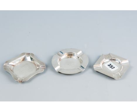 A parcel of three silver ashtrays being two square engine turned and one plain silver, total 4 ozs