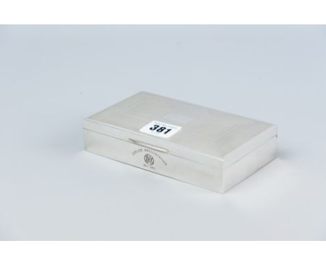 An engine turned oblong silver cigarette box being a Jubilee Presentation, Birmingham 1963 in its original cardboard box