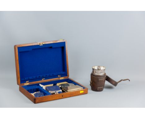 An electroplated hunting flask and two beakers, all in a leather case, an all metal electroplated hip flask, a small Art Deco