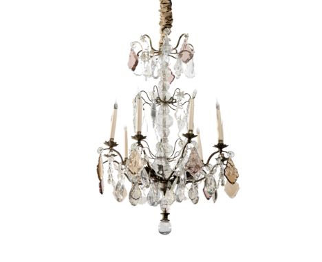 A French bronze and glass nine-light chandelier, second half 20th century, the moulded baluster stem supporting three tiers o