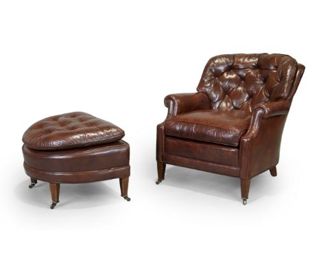 A brown faux leather and button back upholstered armchair, in the manner of Howard and Sons, retailed by Bloomingdales, last 